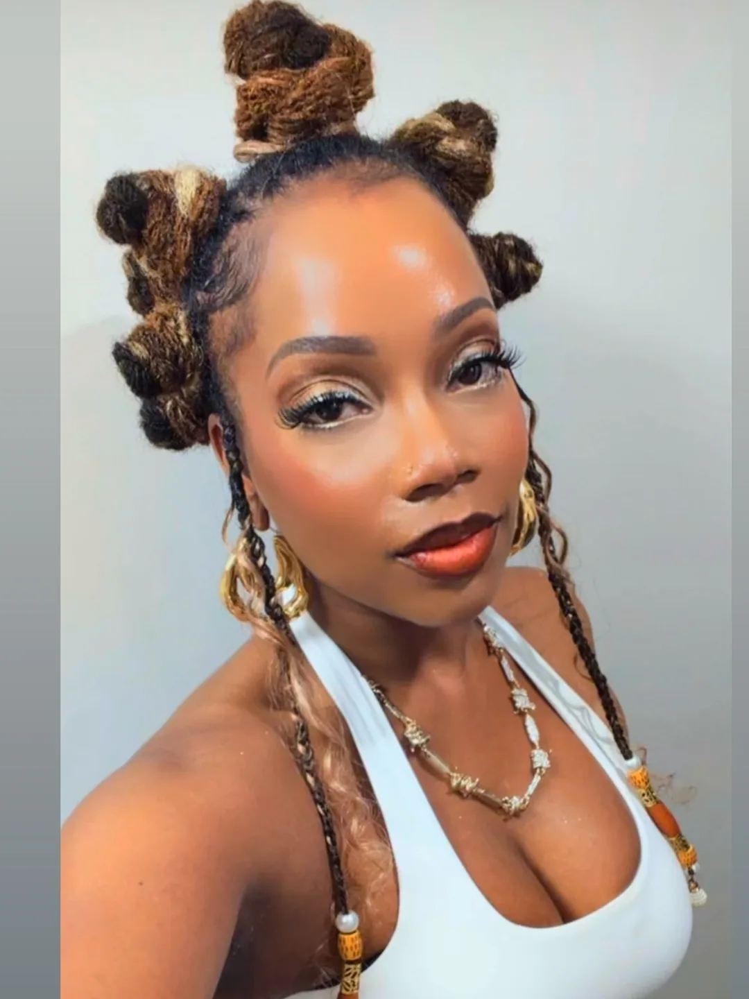 Bantu knots on coloured locs