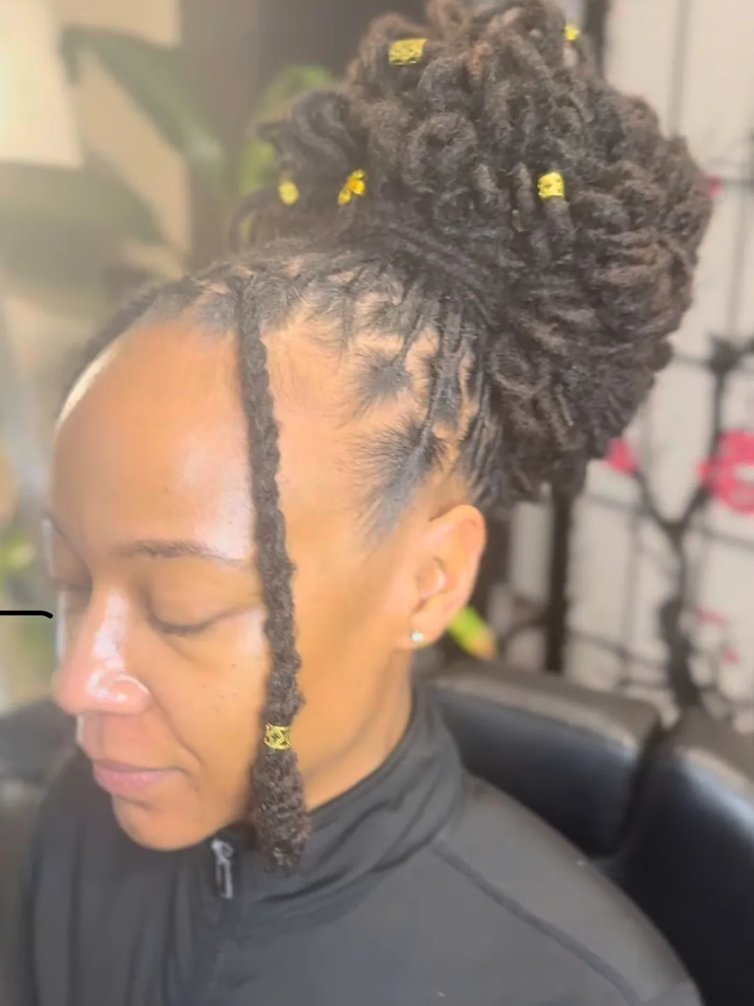 Updo finished with gold cuffs